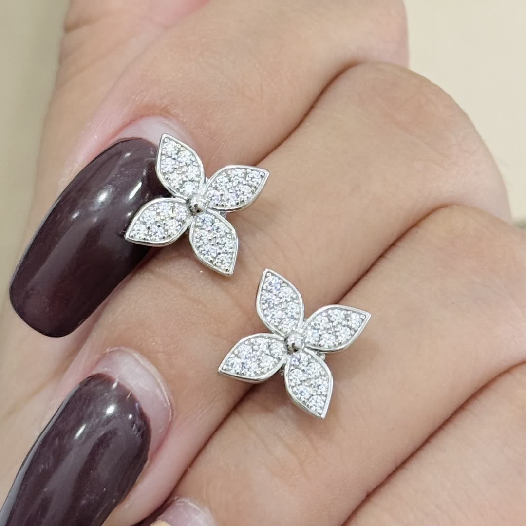 Van Cleef & Arpels Silver Flower Stud Earrings with Diamonds